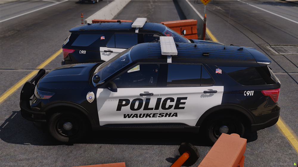 Could contain: vehicle, land vehicle, wheel, road, text, tire, outdoor, auto part, motor vehicle, street, automotive exterior, vehicle registration plate, police, car, officer