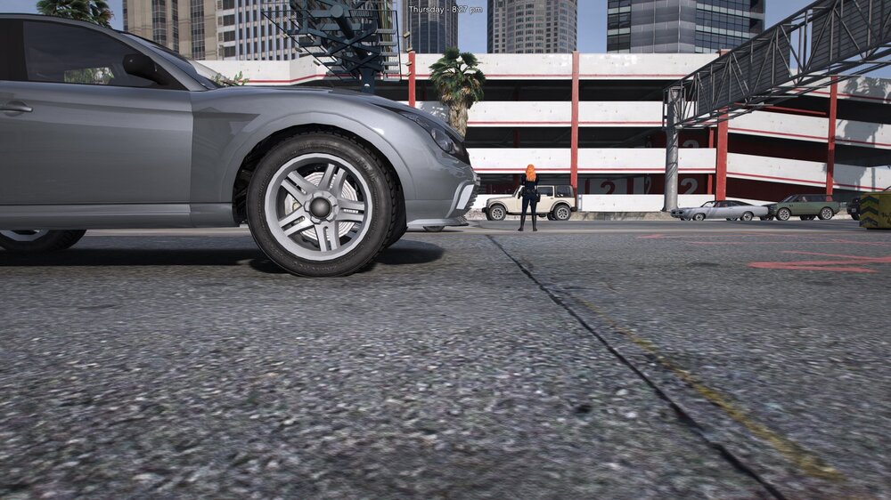 Could contain: wheel, tire, vehicle, outdoor, land vehicle, auto part, road, building, alloy wheel, rim, ground, street, automotive tire, hubcap, automotive design, automotive exterior, automotive wheel system, family car, car, parked, parking, city