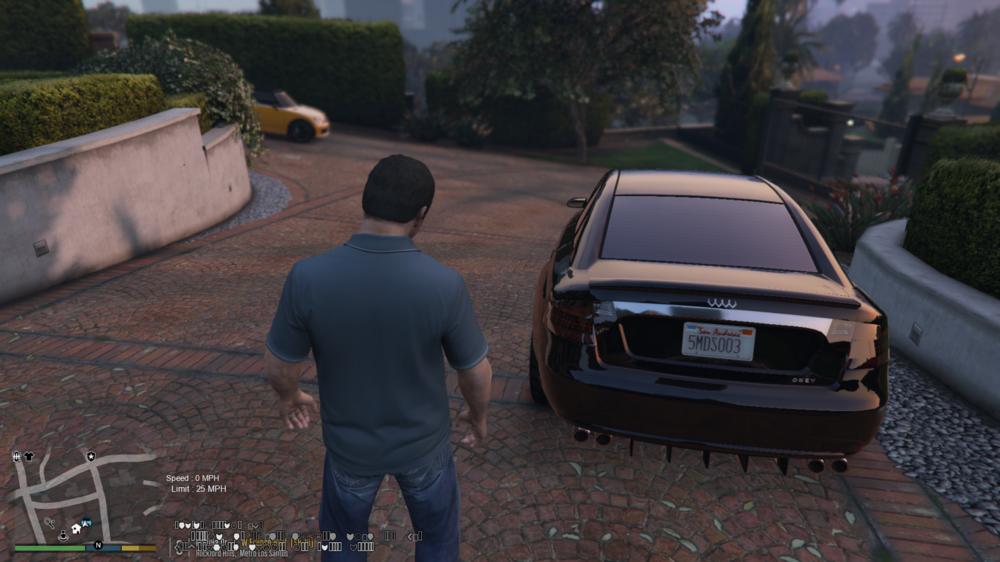 Could contain: car, vehicle, outdoor, land vehicle, man, wheel, ground, clothing, tire, person