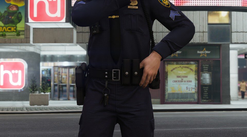 Could contain: clothing, person, police officer, law enforcement, security, outdoor, man, official, officer, trousers, standing, police, street, uniform