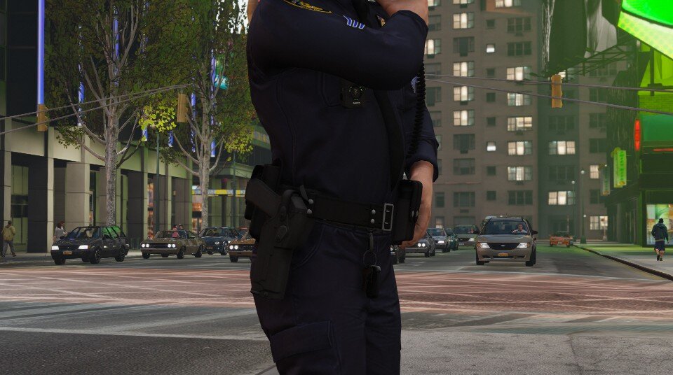 Could contain: clothing, outdoor, person, building, man, vehicle, land vehicle, trousers, street, car, road, police officer, officer, city, police
