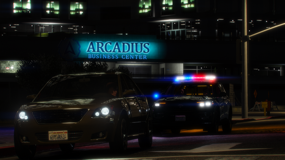 Could contain: vehicle, land vehicle, text, wheel, outdoor, car, building, vehicle registration plate, road, street, night, automotive lighting, light, traffic, city, driving, police, sign