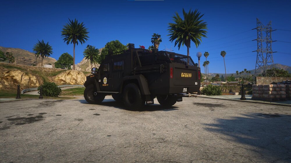 Could contain: outdoor, sky, wheel, vehicle, land vehicle, tire, tree, transport, auto part, palm tree, ground, truck, military vehicle, off-road vehicle, desert, jeep, parked