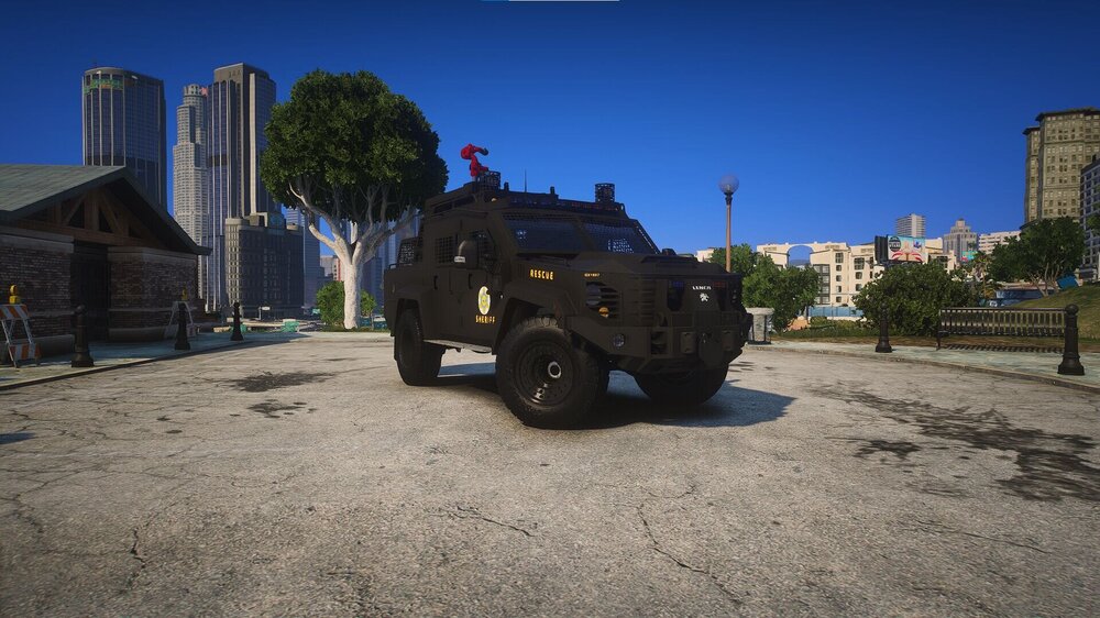 Could contain: sky, outdoor, vehicle, transport, land vehicle, wheel, ground, tree, military vehicle, building, tire