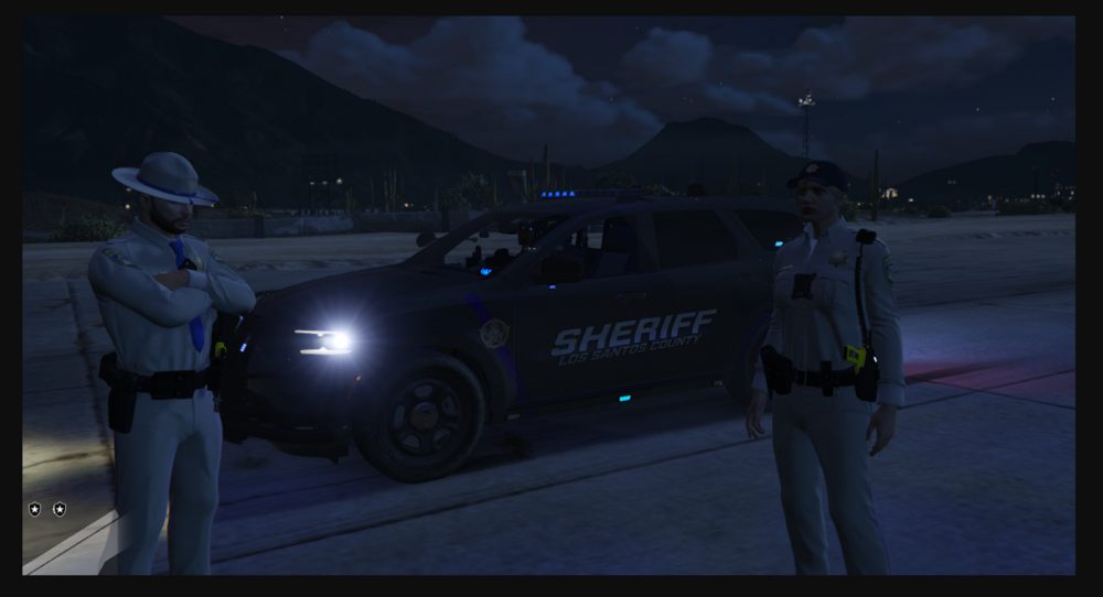 Could contain: vehicle, land vehicle, wheel, tire, clothing, outdoor, car, screenshot, sky, person