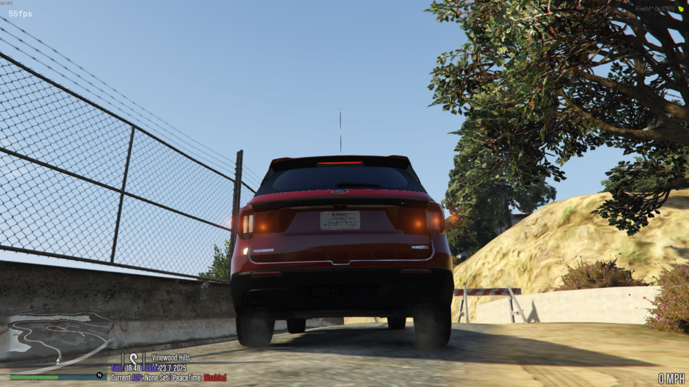 Could contain: outdoor, vehicle, land vehicle, sky, car, wheel, tree, tire, ground, bridge