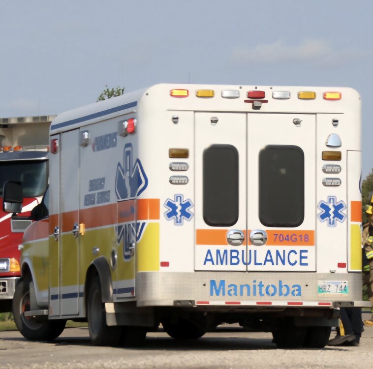 Could contain: transport, vehicle, land vehicle, wheel, outdoor, emergency vehicle, emergency service, text, emergency, mode of transport, ambulance, service, van, paramedic