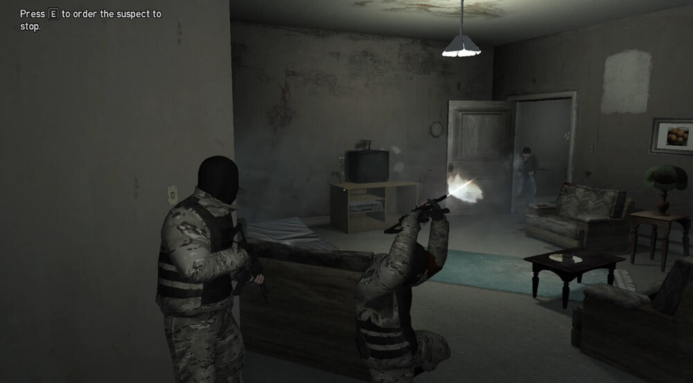 Could contain: indoor, wall, furniture, clothing, screenshot, table, weapon, person, room, ceiling