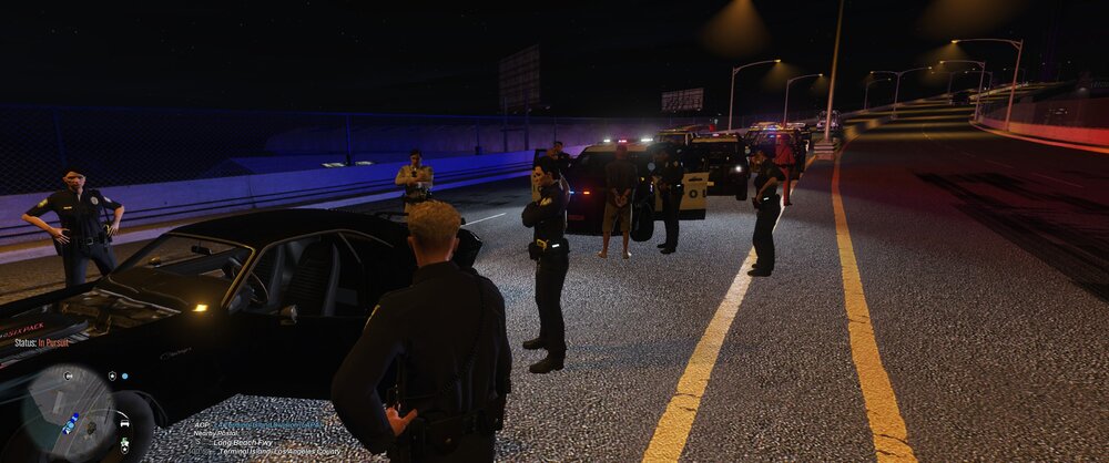 Could contain: vehicle, land vehicle, outdoor, road, clothing, wheel, person, tire, ground, people, night, street, car