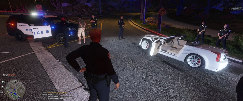 Could contain: vehicle, wheel, land vehicle, tire, outdoor, clothing, person, footwear, man, ground, road, car, street