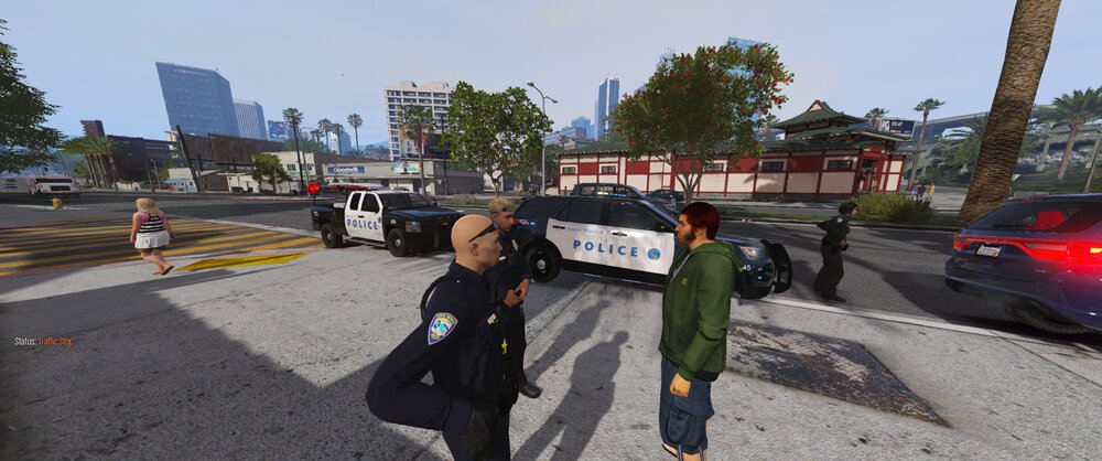 Could contain: outdoor, sky, car, tree, vehicle, land vehicle, footwear, road, clothing, text, person, road surface, asphalt, wheel, pedestrian, thoroughfare, way, lane, street, ground, sign, city, sidewalk