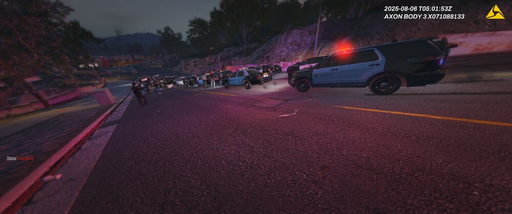 Could contain: road, vehicle, outdoor, land vehicle, car, text, screenshot, asphalt, wheel, road surface, tree, street, ground