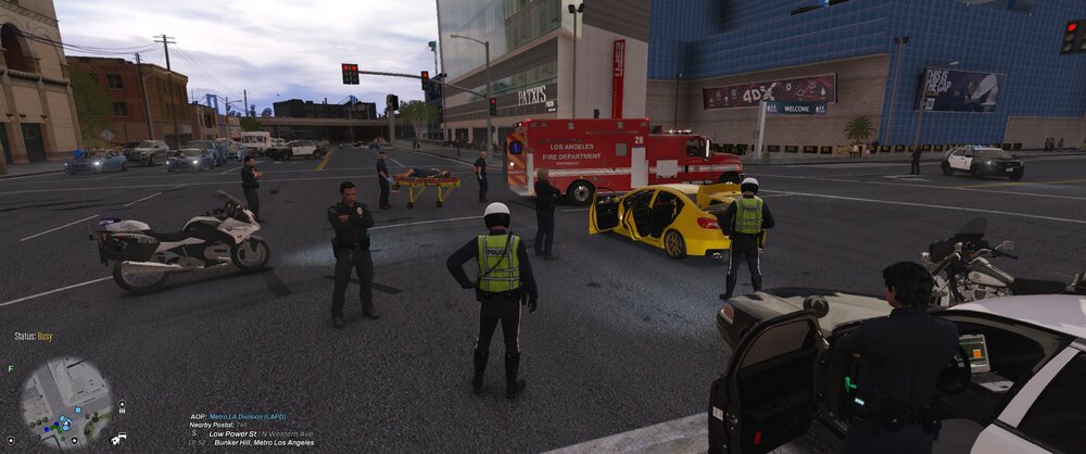 Could contain: land vehicle, vehicle, outdoor, sky, wheel, car, road, building, text, firefighter, street, person, people