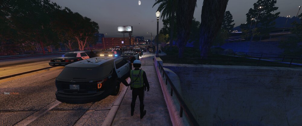 Could contain: outdoor, sky, land vehicle, vehicle, car, tree, road, screenshot, ground, street