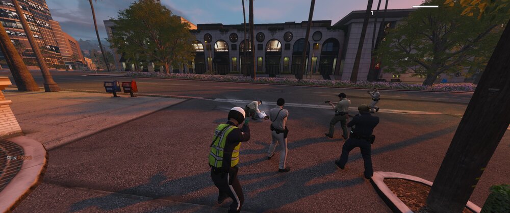 Could contain: outdoor, tree, sky, firefighter, person, screenshot, ground, road, street