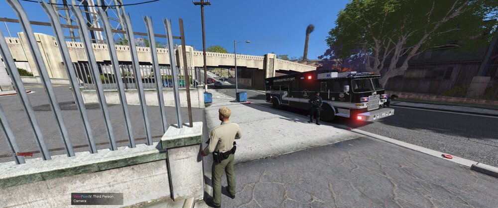 Could contain: outdoor, sky, vehicle, land vehicle, road, tree, road surface, wheel, car, street, ground, sidewalk