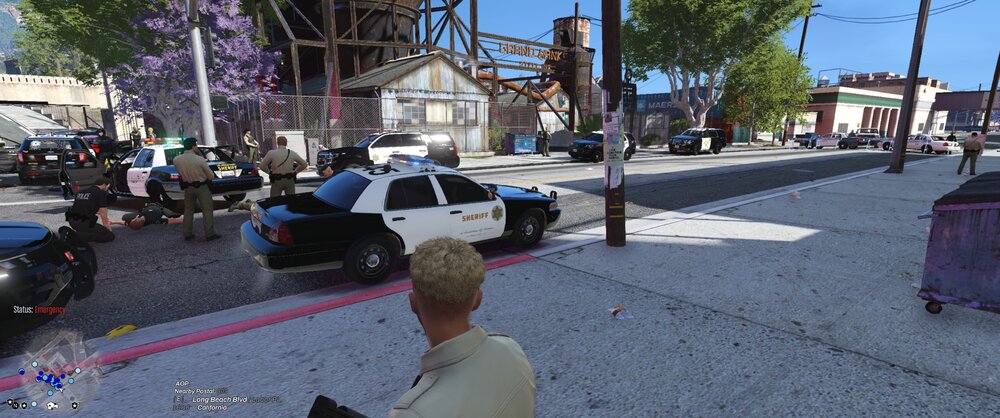 Could contain: outdoor, car, land vehicle, vehicle, tree, wheel, sky, clothing, road, man, person, way, ground, street, city, purple