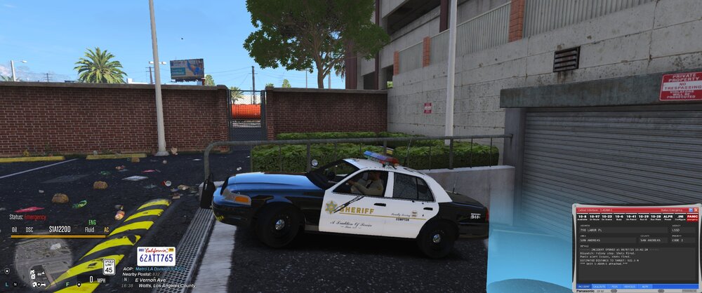 Could contain: text, vehicle, land vehicle, outdoor, tire, wheel, building, transport, waste container, car, parked