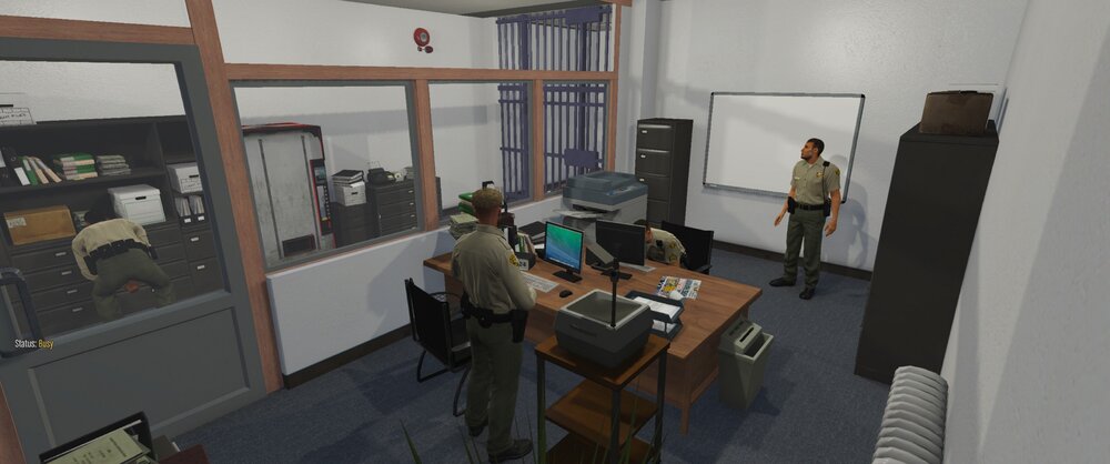 Could contain: indoor, furniture, wall, desk, computer, table, chair, floor, room, office