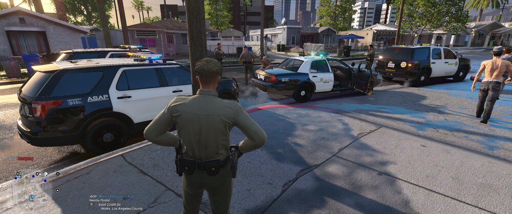 Could contain: vehicle, land vehicle, outdoor, car, wheel, clothing, tire, man, footwear, tree, person, truck, vehicle registration plate, van, road, street, ground, police