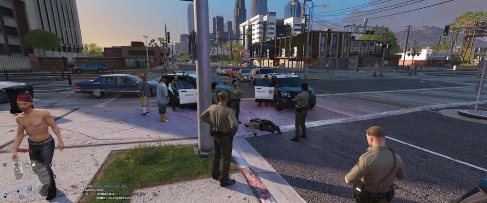 Could contain: outdoor, sky, clothing, car, footwear, man, land vehicle, vehicle, road, building, sidewalk, tree, pedestrian, street, person, way, ground, city, people