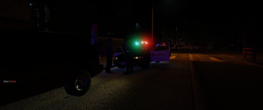 Could contain: outdoor, wheel, darkness, street light, night, vehicle, road surface, road, light, ground, street, dark