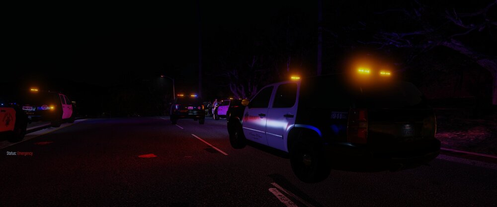 Could contain: outdoor, vehicle, car, land vehicle, night, road, street light, street, darkness, dark, light, parked