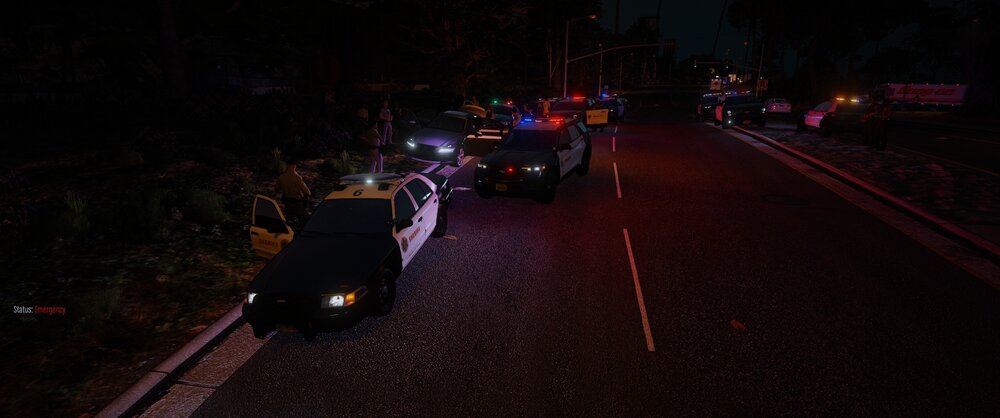 Could contain: outdoor, vehicle, car, road, land vehicle, street, night, way, road surface, thoroughfare, asphalt, darkness, light, dark, ground