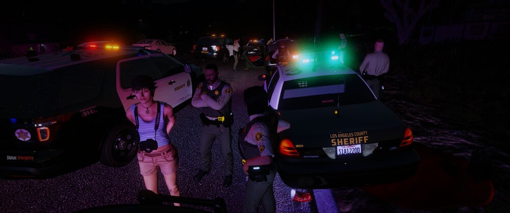 Could contain: outdoor, car, vehicle, land vehicle, clothing, person, night, ground, people, light