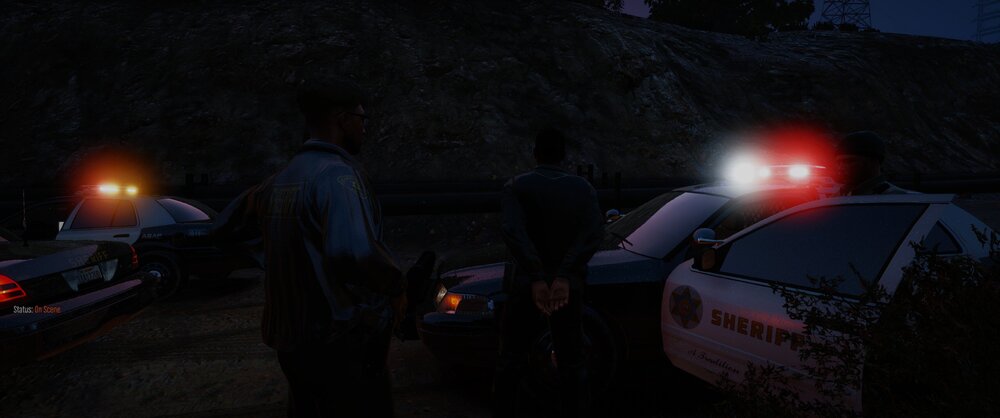 Could contain: outdoor, vehicle, land vehicle, car, person, street, night, light, people