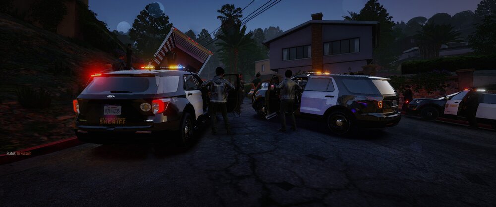 Could contain: land vehicle, vehicle, outdoor, transport, wheel, sky, tire, road, vehicle registration plate, tree, auto part, motor vehicle, car, automotive tail & brake light, emergency service, automotive lighting, truck, fire, parked, van, light, ambulance, street