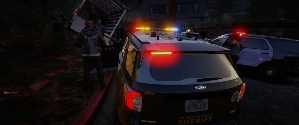 Could contain: vehicle, land vehicle, outdoor, transport, wheel, car, text, vehicle registration plate, automotive tail & brake light, automotive lighting, auto part, firefighter, light, street, night