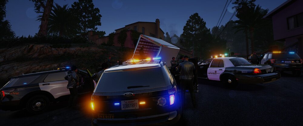 Could contain: vehicle, land vehicle, outdoor, transport, sky, wheel, car, road, automotive lighting, motor vehicle, vehicle registration plate, automotive tail & brake light, automotive exterior, van, automotive parking light, auto part, night, street, parked, light, ambulance