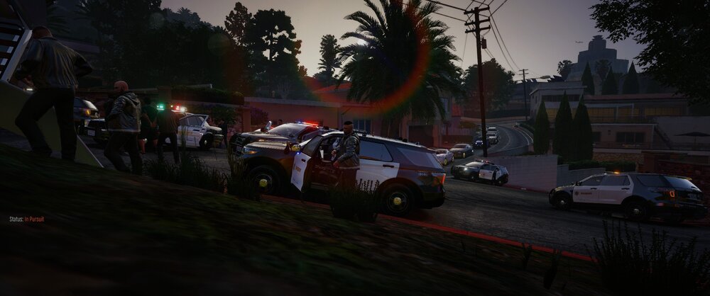 Could contain: outdoor, vehicle, land vehicle, sky, tree, wheel, road, grass, people, street, car