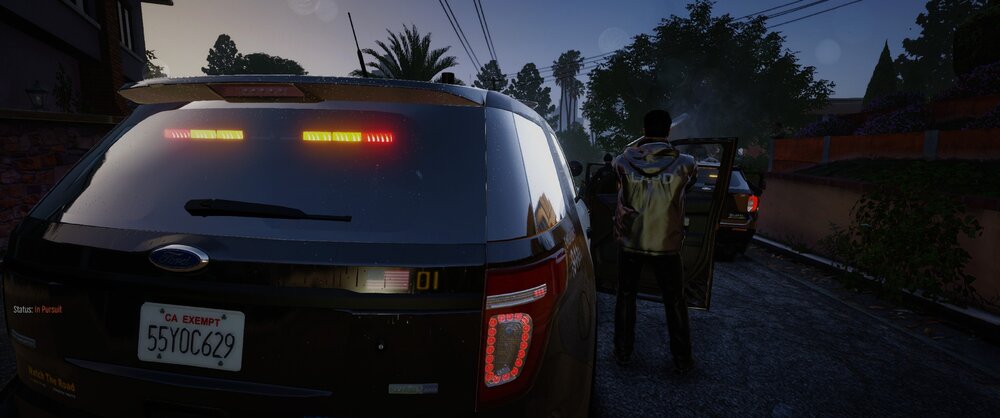 Could contain: vehicle, land vehicle, outdoor, sky, text, vehicle registration plate, car, automotive tail & brake light, automotive lighting, automotive exterior, auto part, person