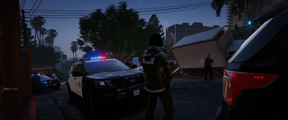 Could contain: vehicle, land vehicle, outdoor, sky, automotive tail & brake light, car, auto part, wheel, automotive exterior, vehicle registration plate, automotive lighting, tire, police, light