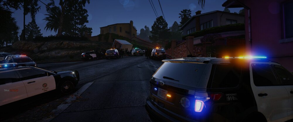 Could contain: land vehicle, vehicle, outdoor, transport, sky, wheel, road, vehicle registration plate, automotive tail & brake light, van, automotive lighting, motor vehicle, automotive exterior, auto part, minivan, family car, light, street, night, parked, police, car