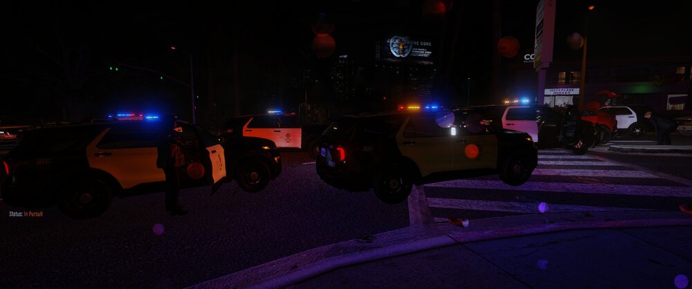 Could contain: outdoor, street, darkness, night, road, light, city, people