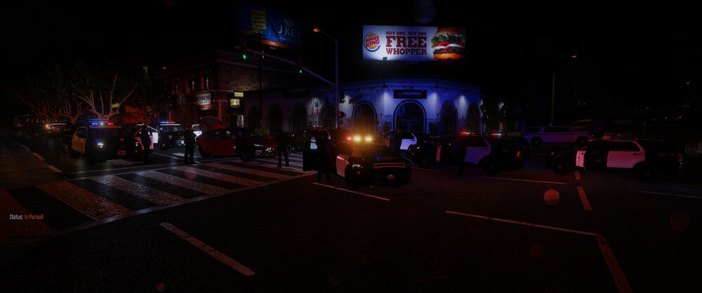 Could contain: outdoor, night, electricity, street, light, street light, vehicle, darkness, road, sky, way, city, dark