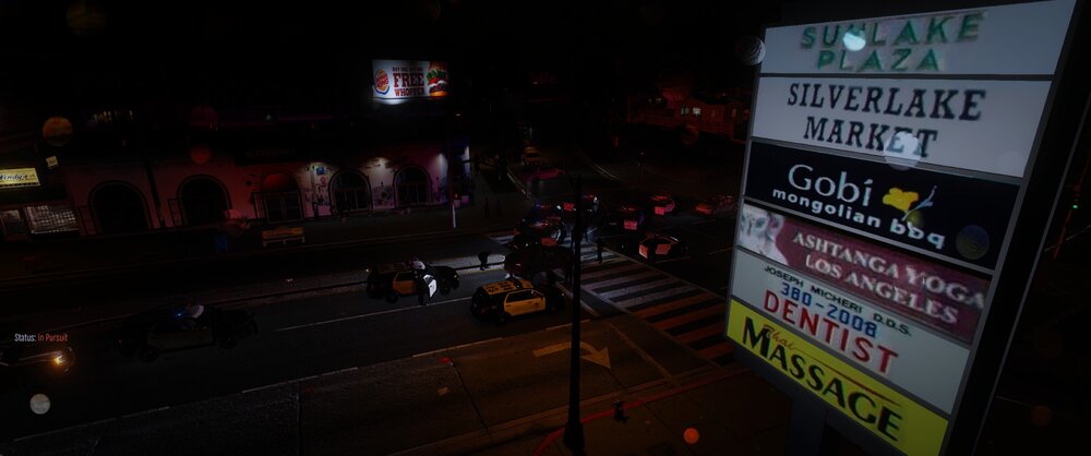 Could contain: text, billboard, outdoor, sign, night, street, city