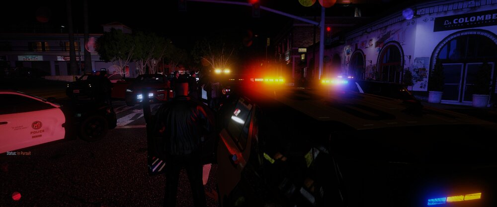 Could contain: outdoor, car, vehicle, land vehicle, night, street, light, person, people, dark