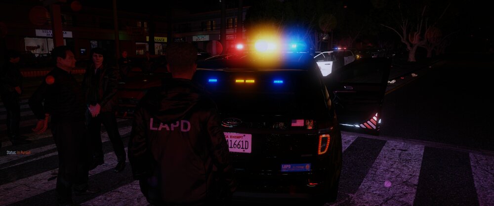 Could contain: outdoor, night, vehicle, land vehicle, darkness, street, ground, person, light, city