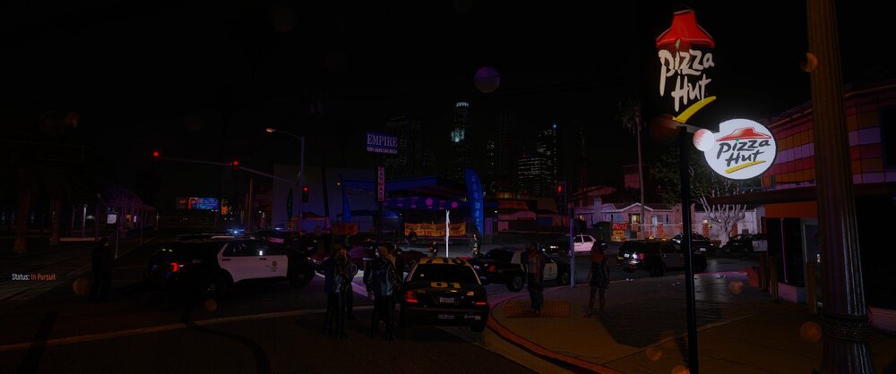 Could contain: outdoor, night, building, neon, electronic signage, billboard, street, sign, city, light