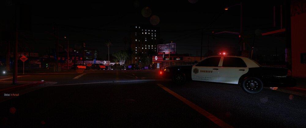 Could contain: vehicle, outdoor, land vehicle, road, wheel, night, street, building, light, tire, city, car