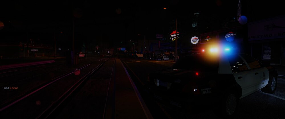 Could contain: outdoor, electricity, darkness, vehicle, night, light, land vehicle, sky, way, train, track, street, traffic light