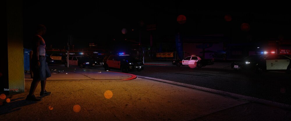 Could contain: outdoor, road, street, street light, night, sky, road surface, darkness, electricity, car, light, vehicle, asphalt, ground, person, city