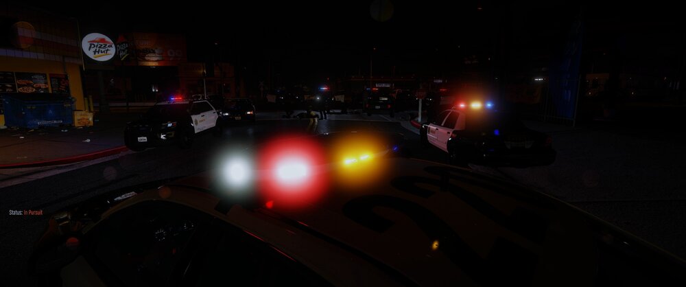 Could contain: vehicle, outdoor, land vehicle, darkness, light, car, night, street, traffic light