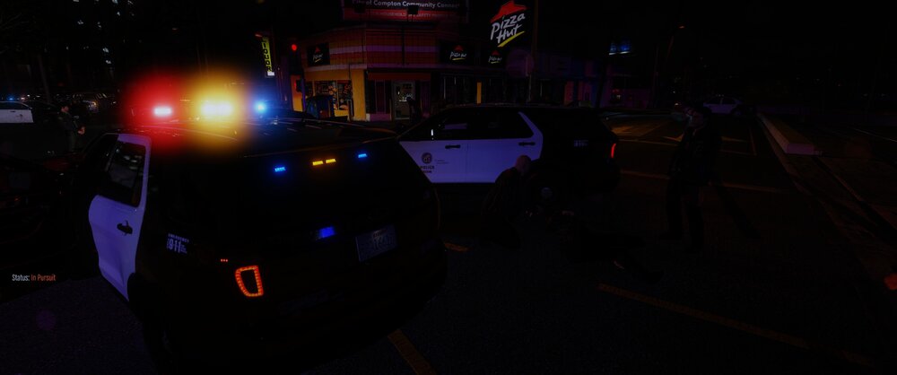 Could contain: vehicle, land vehicle, outdoor, night, light, car, street, city, dark