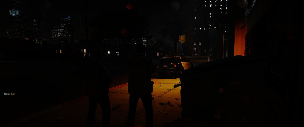 Could contain: outdoor, night, darkness, skyscraper, car, street, city, light, person, dark