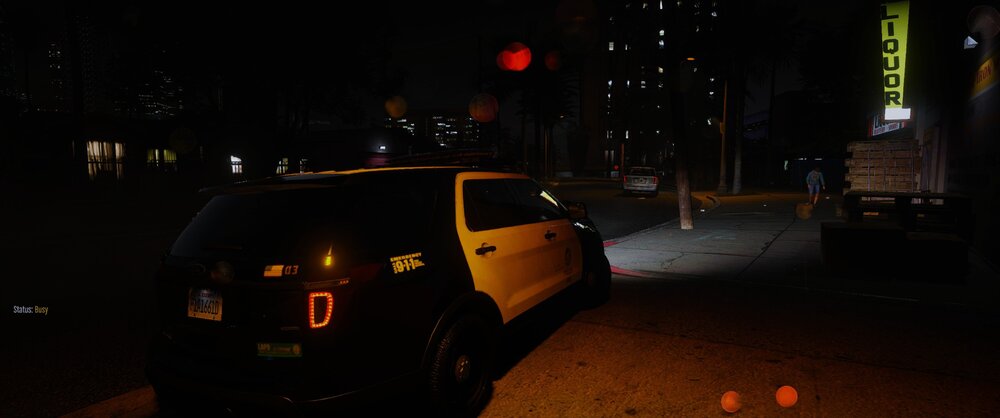 Could contain: vehicle, land vehicle, outdoor, wheel, transport, night, tire, building, automotive tail & brake light, vehicle registration plate, auto part, automotive lighting, street, light, road, dark, city, car, parked